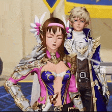 a girl in a pink top is standing next to a man in armor
