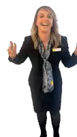a woman wearing a black jacket and a scarf has a name tag that says ' sarah '