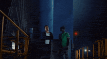 a man with his arms outstretched looks up at something