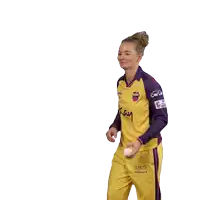 a woman wearing a yellow and purple shirt with kay on it