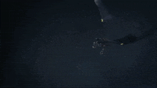 a cartoon of a robot fighting a dragon in the dark