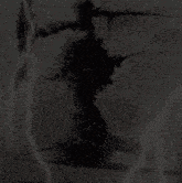 a blurred image of a landscape with a few spots of light on it