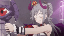 a girl with horns and a crown on her head is holding a purple object
