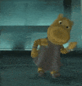 a cartoon character is standing in a dark room with a red object behind him