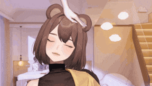 a girl with bear ears on her head is being touched by a white hand
