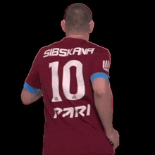 a man wearing sunglasses and a shirt that says che c ebalom on it