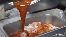 sauce is being poured into a pan with the words made in animotica on the bottom