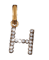 a gold letter h pendant with diamonds on it