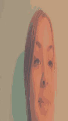 a close up of a woman 's face with her tongue sticking out