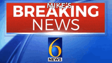 a sign that says mike 's breaking news
