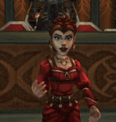 a woman in a red dress is standing in front of a statue