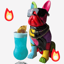 a colorful statue of a dog next to a blue cocktail