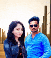 a man and a woman standing next to each other with the word vidu in the corner