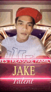 a young man wearing a red hat and a white shirt is named jake talent