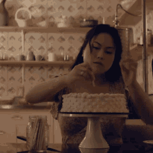 Putting Candles Amy B Tiong GIF - Putting Candles Amy B Tiong Bustle GIFs