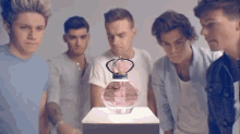 2. The Merchandise. GIF - One Direction 1d Perfume GIFs