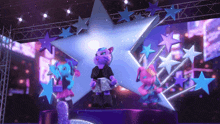 a group of cartoon characters standing on a stage in front of a star