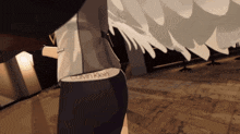 a woman wearing calvin klein underwear is walking