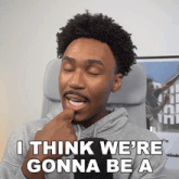 a man with curly hair and a mustache says " i think we 're gonna be a "
