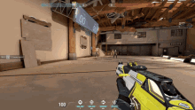 a video game is being played in a warehouse with a sign that says 00 on it