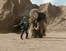 a man in a helmet stands next to a ram with horns