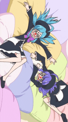 a girl with blue hair is laying on a pillow