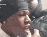 a close up of a person 's face with the words " cause she don 't like " on the bottom right