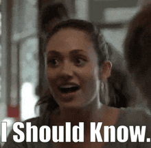 a woman with a surprised look on her face and the words i should know .