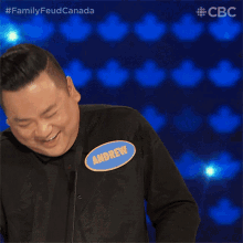 Laughing Andrew Phung GIF - Laughing Andrew Phung Family Feud Canada GIFs