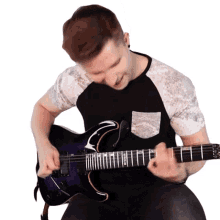 tongue out cole rolland playing guitar making music guitarist