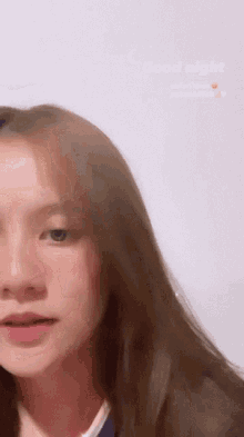 a close up of a woman 's face with the words " good night " written above her