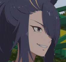 a close up of a person 's face with a big smile on it