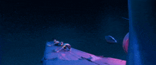 a group of people are sitting on a boat with a flame coming out of it