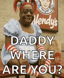 a wendy 's sign is behind a woman in a costume