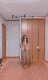 a man with curly hair is standing in a room with the words diddy party below him