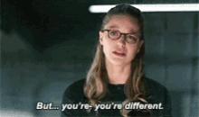 a woman wearing glasses is talking to someone and says `` but ... you 're you 're different . ''