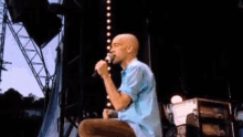 singing reaching out live performance stage performance michael stipe