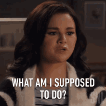 What Am I Supposed To Do Selena Gomez GIF - What Am I Supposed To Do Selena Gomez Saturday Night Live GIFs