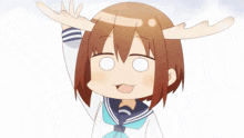 a girl with antlers on her head is smiling