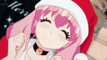 a pink haired anime girl wearing a santa hat