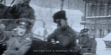 the first step is important in life written on a black and white photo