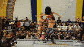 a group of wrestlers are in a ring with the caption #effygayla on the screen