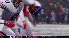 a football game is being played between the chiefs and the bills