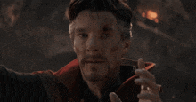 doctor strange giving a thumbs up with the words one more year written below him