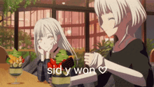 two anime girls sitting at a table with sid y won written in white