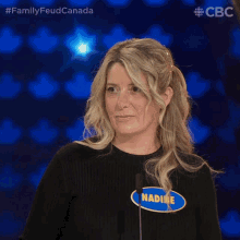 Chuckle Nadine GIF - Chuckle Nadine Family Feud Canada GIFs
