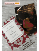 a box of moroccan nights nuits marocaines perfume next to a magazine