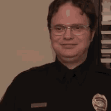 Dwight Schrute The Office GIF - Dwight Schrute The Office Laughing GIFs