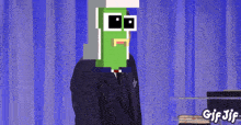 a gif of a man in a suit with a pixelated face and the words gif jif at the bottom