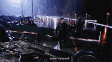 a man walking down a street says john ! felicity